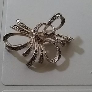 Marcasite and sterling silver bow brooch